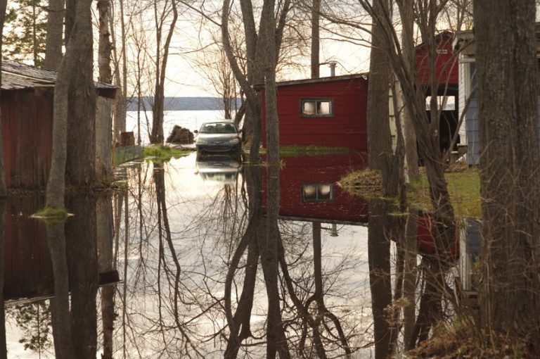 Jocko Point residents maintain sandbags around their properties
