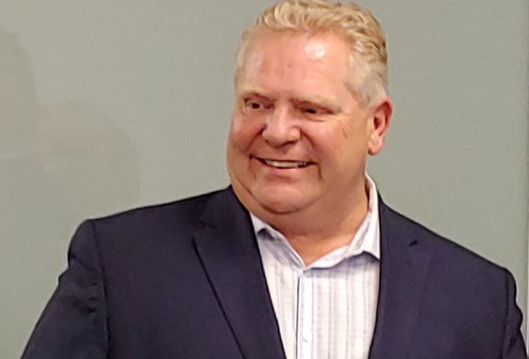 Premier slashes hydro rates; warns construction sector and provides relief for truckers