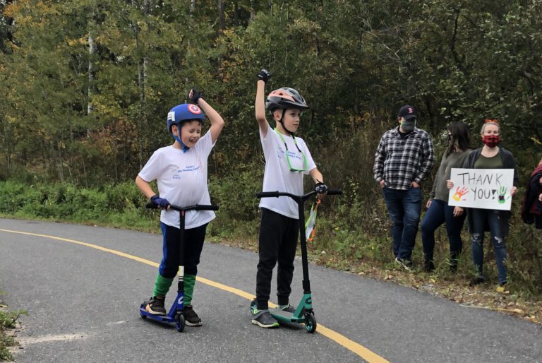 Brothers complete summer-long scooter ride, raise money for Hands