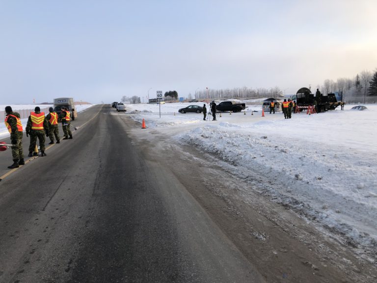 22 Wing members brave cold to help food bank